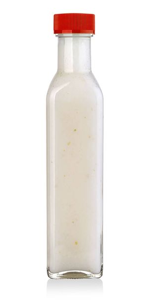 Fokhagyma mártás üvegben - Fotó, kép