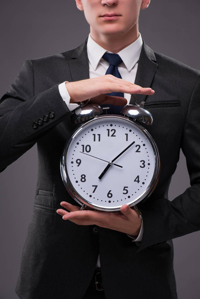 Επιχειρηματίας στην έννοια διαχείρισης του χρόνου - Φωτογραφία, εικόνα