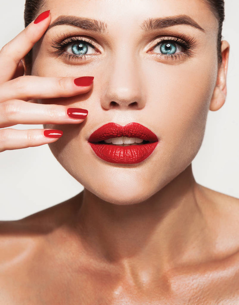 Beautiful young model with red lips  - Zdjęcie, obraz