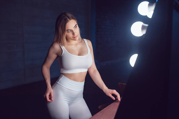 Sexy girl with huge breast in a white top and leggings. Mock-up. - Valokuva, kuva