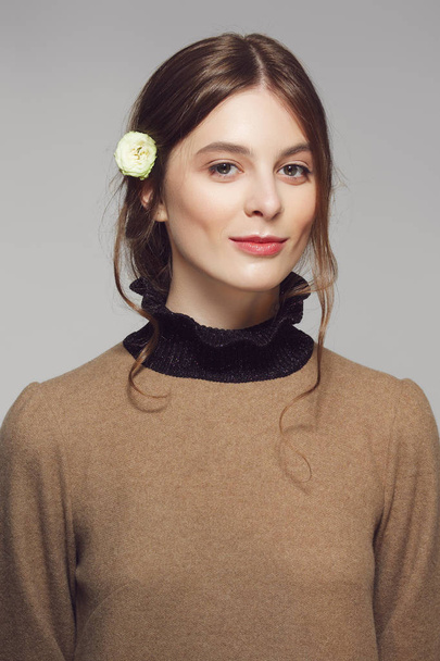 Portrait of a young cute woman in warm wool sweater. Clean prett - Φωτογραφία, εικόνα