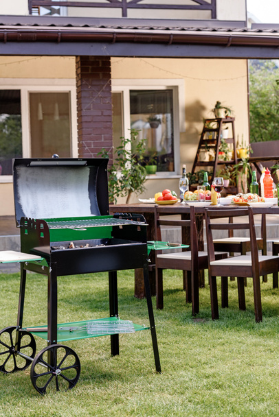 Grill on green lawn  - Photo, Image