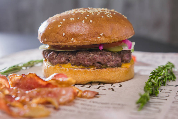 A fresh tasty burger on a table - Photo, Image