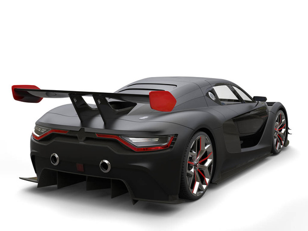 Superbe voiture noire mate avec grande aile arrière avec côtés rouges
 - Photo, image