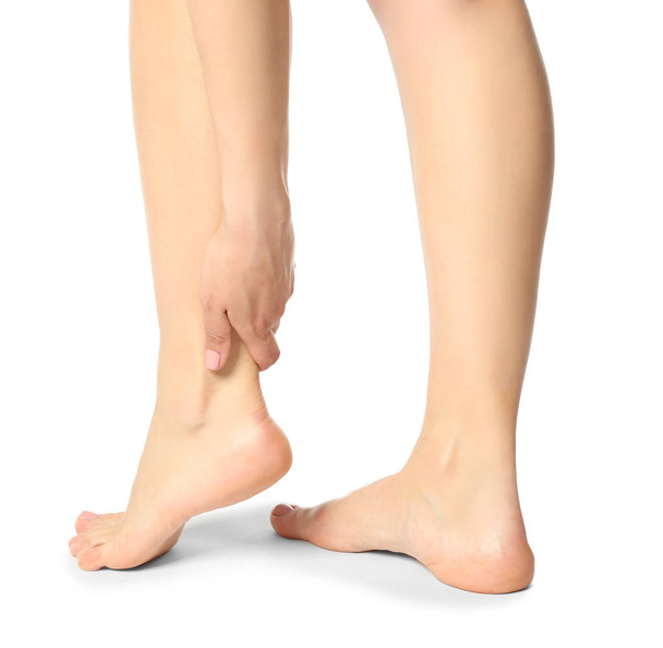 woman suffering from pain in leg - Foto, immagini