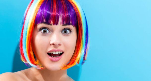 Beautiful woman in a colorful wig - Foto, afbeelding