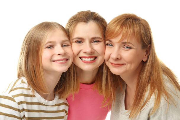 Happy young woman with her mother and daughter on white background - Φωτογραφία, εικόνα