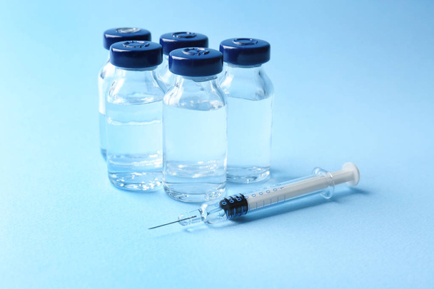Vaccine in vials with syringe   - Foto, Imagem