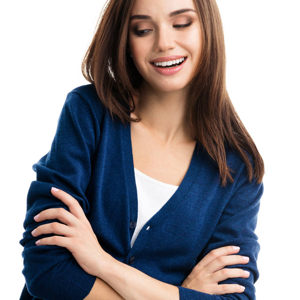 smiling young woman with crossed arms, isolated  - Foto, imagen