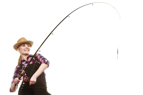 Happy woman in sun hat holding fishing rod - Foto, imagen