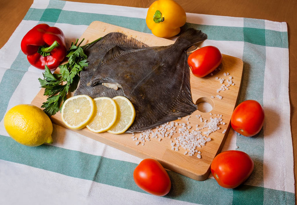 Fresh raw flounder on cutting board - Photo, Image