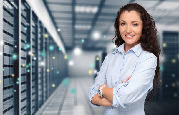 young woman in server room - 写真・画像