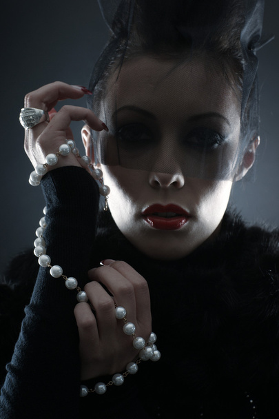 Portrait of female vampire over dark background - Valokuva, kuva