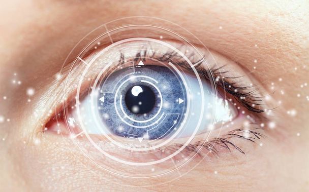 female eye with digital hologram - Фото, зображення