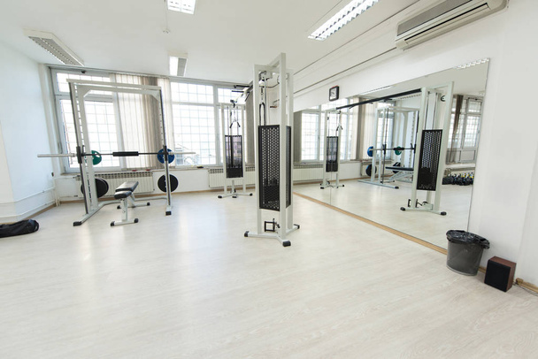 Equipment And Machines At The Modern Gym Room Fitness Center - Foto, Imagen