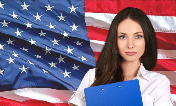  woman on USA flag background - Фото, изображение