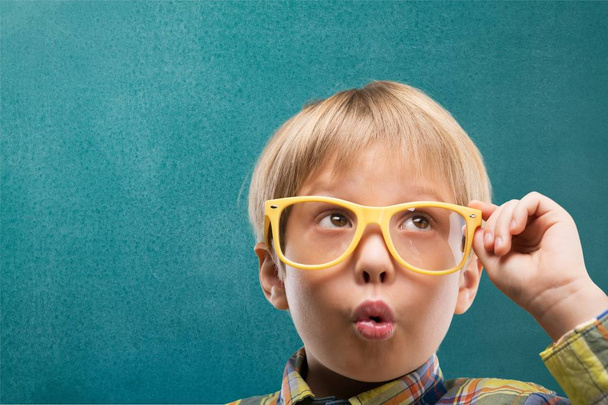 young boy in  glasses thinking - Photo, Image