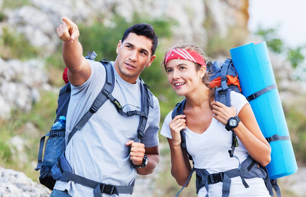 young couple of backpackers - Photo, Image