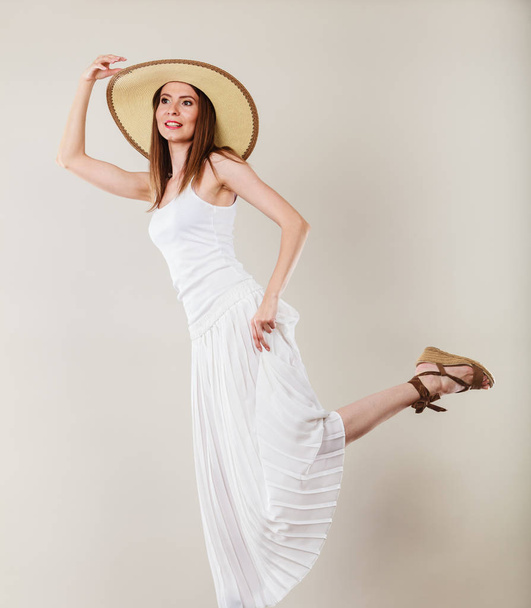 Woman in straw summer hat white dress - Fotó, kép