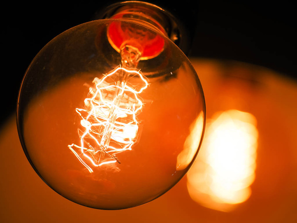 Vintage glowing light bulb - Fotó, kép