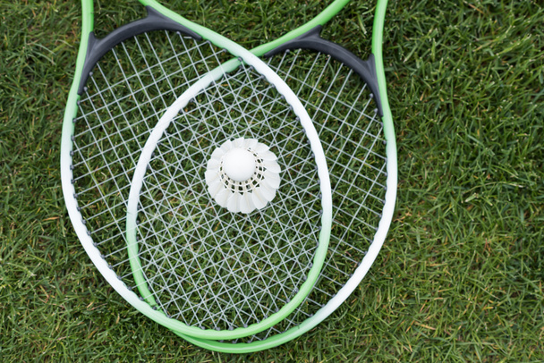 Shuttlecock on badminton rackets - Φωτογραφία, εικόνα