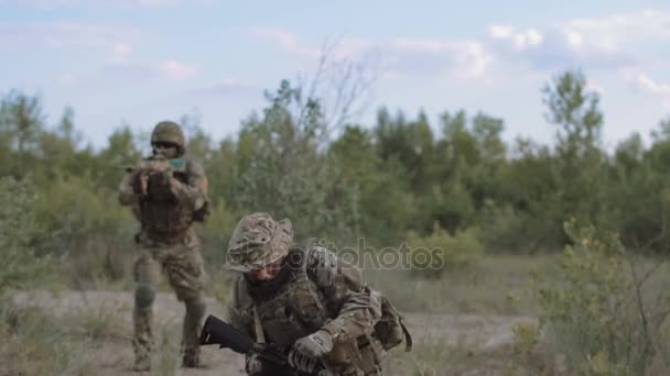 Military forces walking on battlefield - Footage, Video