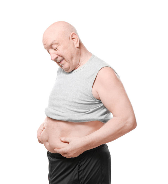Fat senior man on white background. Weight loss concept - Foto, Imagen