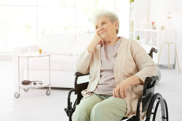 elderly woman in wheelchair - Photo, image