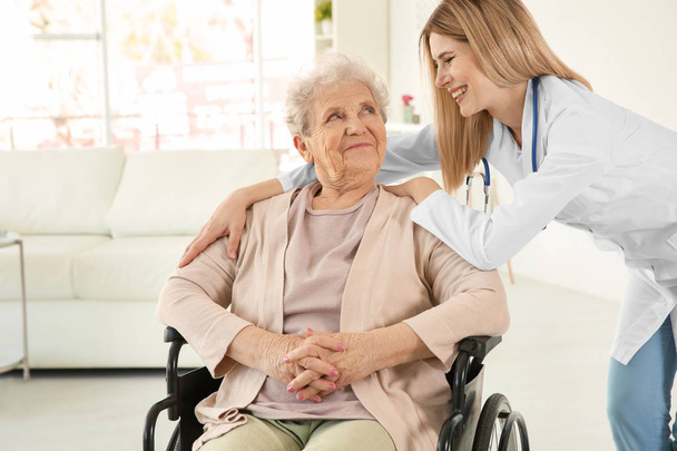 nurse and disabled elderly woman  - Foto, imagen