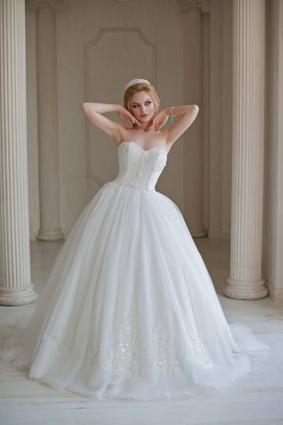 portrait of beautiful blonde bride with fashion hairstyle and make-up - Фото, зображення