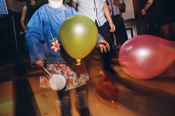 child playing with balloons  - Photo, Image