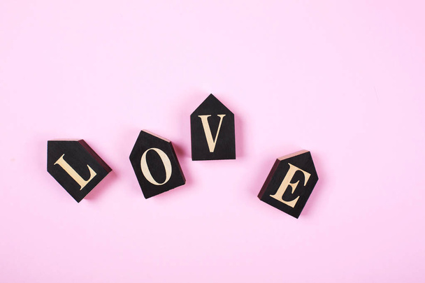 Word LOVE on wooden cubes - Foto, afbeelding