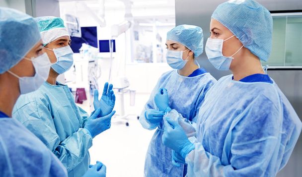 group of surgeons in operating room at hospital - Valokuva, kuva