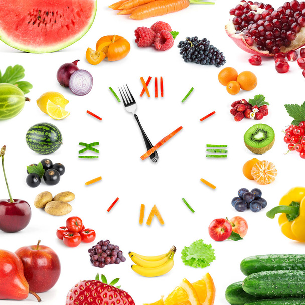 Food clock with fruits and vegetables - 写真・画像