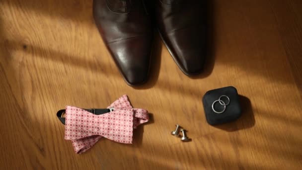 Men shoes and bow tie. Wedding accessories and groom clothes - Footage, Video