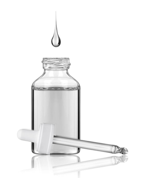 Cosmetic bottle with pipette and falling drop in it - Foto, Imagen