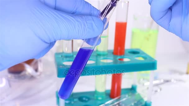 Laboratory test tubes inspection video. - Footage, Video