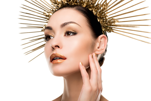 glamorous woman in golden headpiece - Fotó, kép