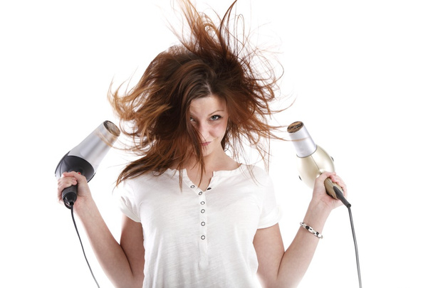 Girl with hair dryers in the hands of - Φωτογραφία, εικόνα
