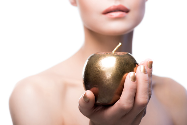lady holding golden apple - Foto, Imagen