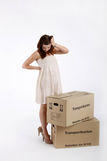 Girl in white dress with boxes - Foto, Imagem