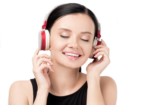 fiatal nő hallgat zenét fülhallgató - Fotó, kép