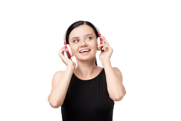 young woman listening music in headphones - Foto, Imagem