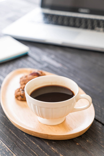 black coffee and cookies with laptop and note book - Фото, изображение