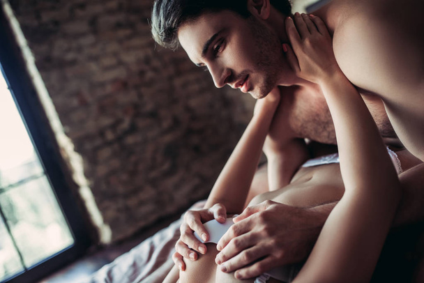 Couple having sex on bed - Valokuva, kuva