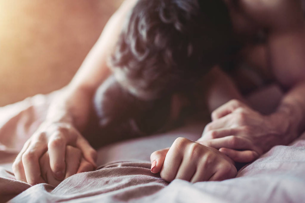 Couple having sex on bed - Foto, imagen