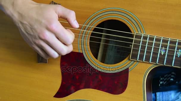 Hand and a part of a guitar playing - Footage, Video