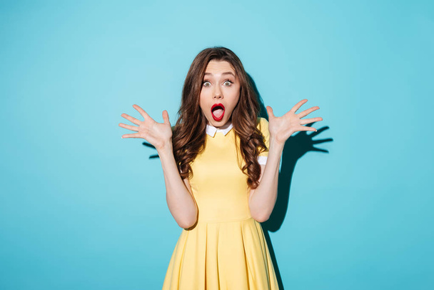 Shocked young brunette woman - Photo, Image