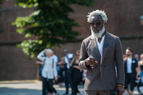 FLORENCE, ITALY-JUNE 15: Fashion people at Pitti Immagine of Uom - 写真・画像