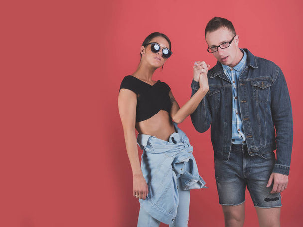 woman and man in glasses and jeans jacket - Fotó, kép